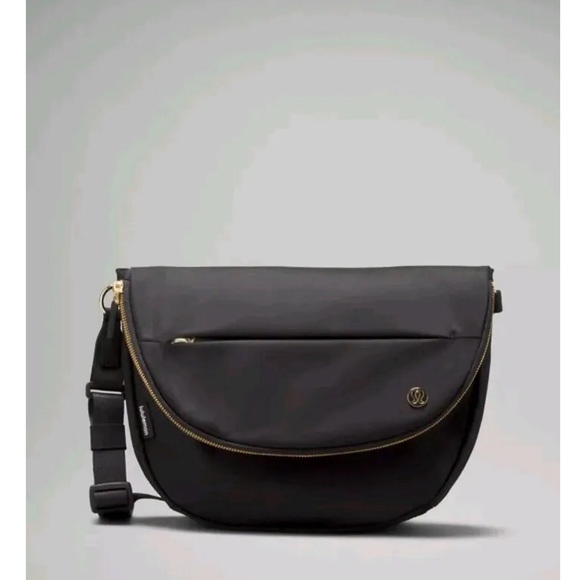 lululemon athletica Handbags - Lululemon All Night Festival bag NWT black/gold